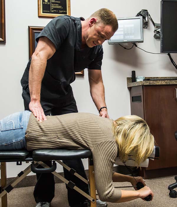 Patient appointment for chiropractic adjustment